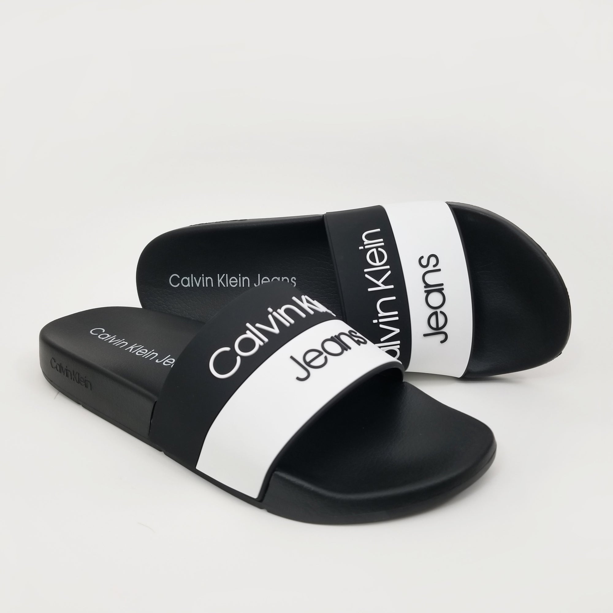 Neuropathie Nominaal Verlaten Calvin Klein Men's Aura Two-Tone Slide Sandals - Life Soleil